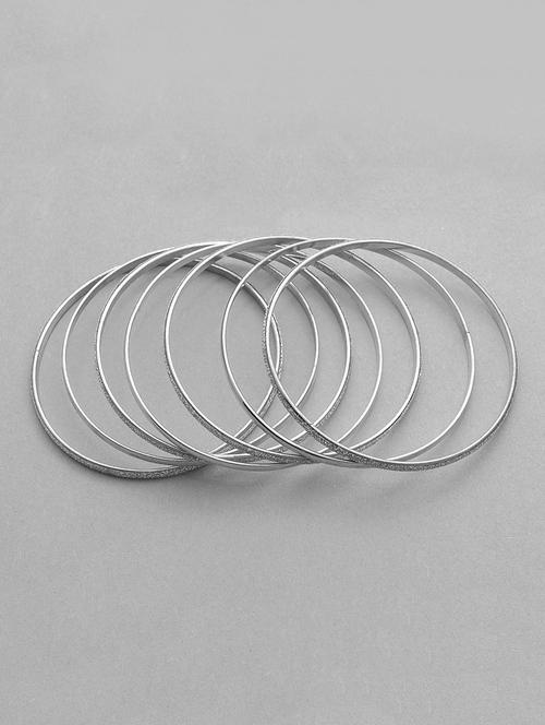 silver metal bangle - 16525768 - Standard Image - 1