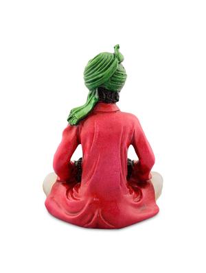 green and orange polyresin rajasthani musician showpiece - 9572165 - Standard Image - 3
