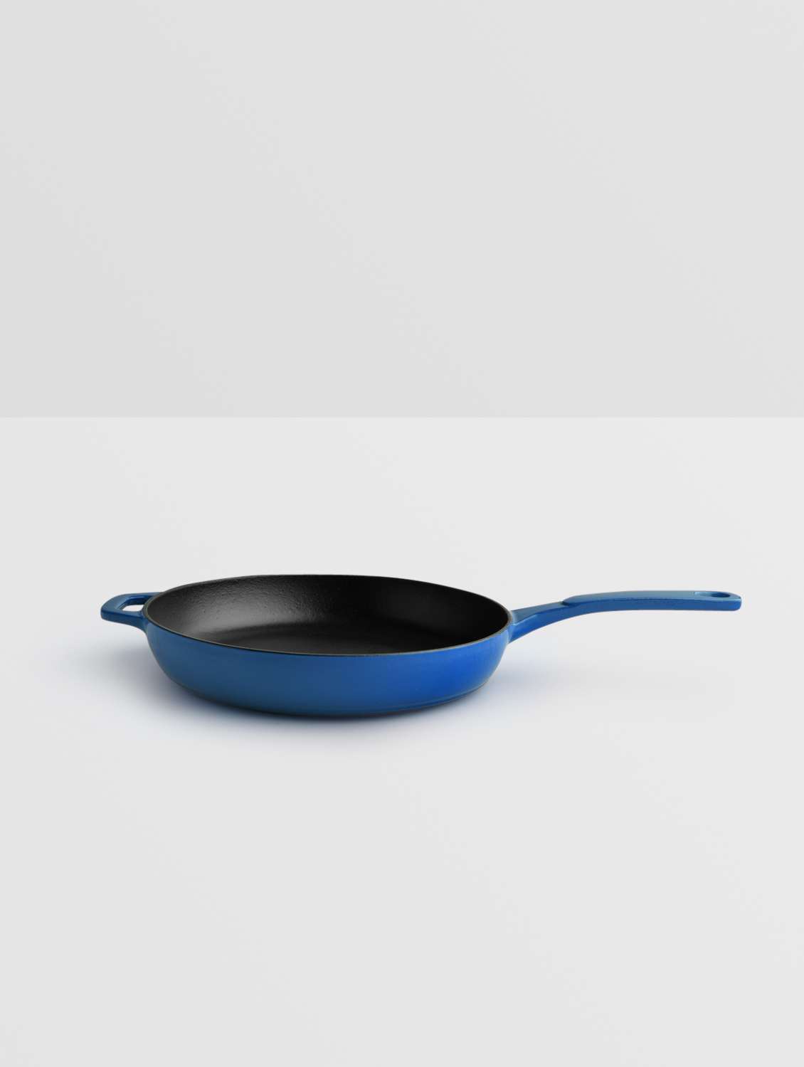 blue and black enameled skillet