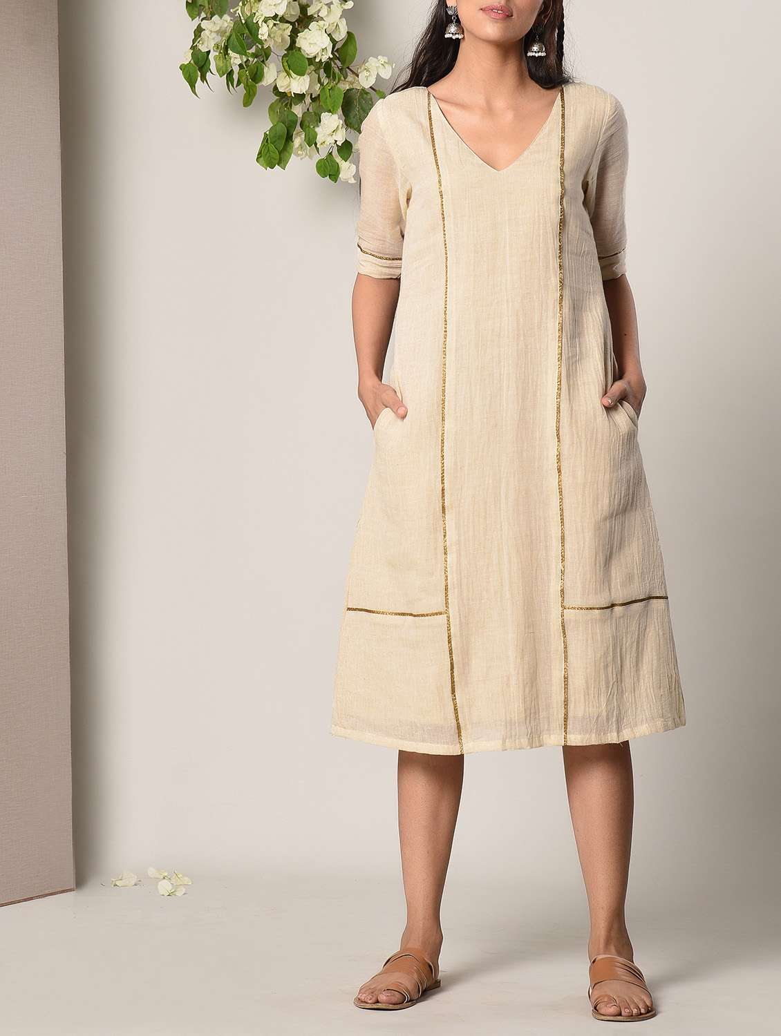 beige dress with pockets