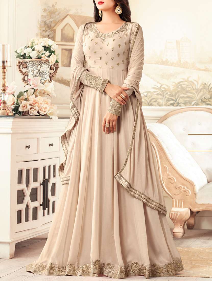 beige embroidered flared dress material