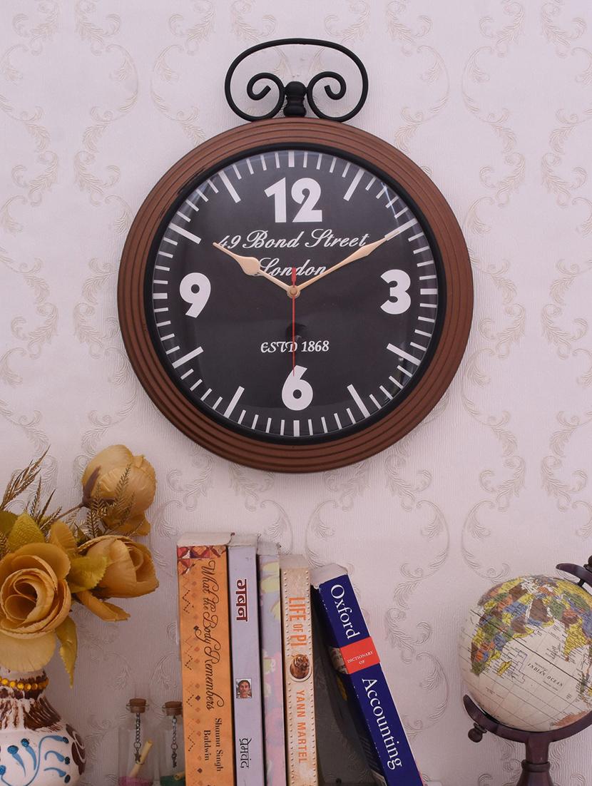 classic iron wall clock by home sparkle - 14096994 - Standard Image - 2