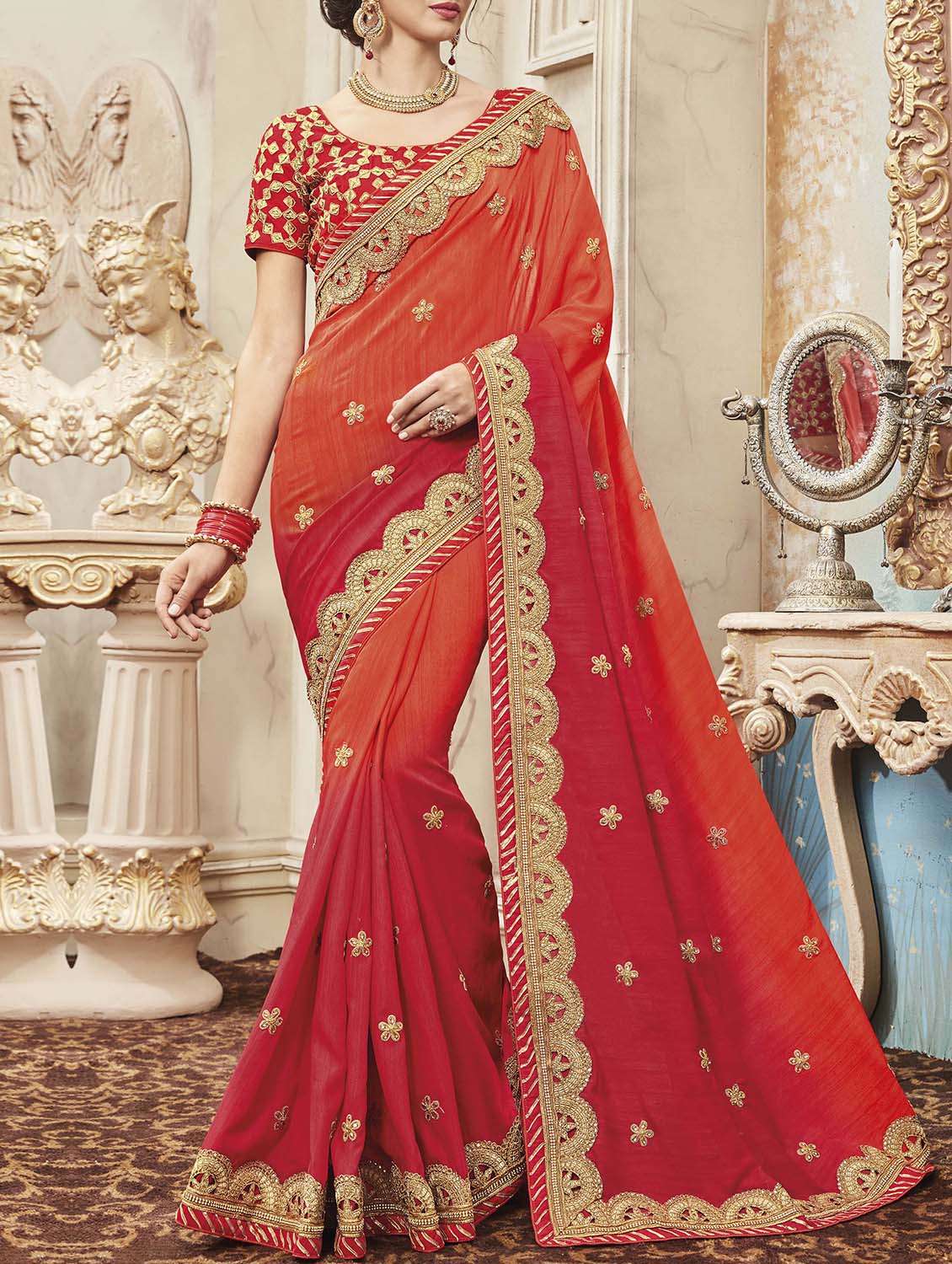 orange embroidered saree with blouse
