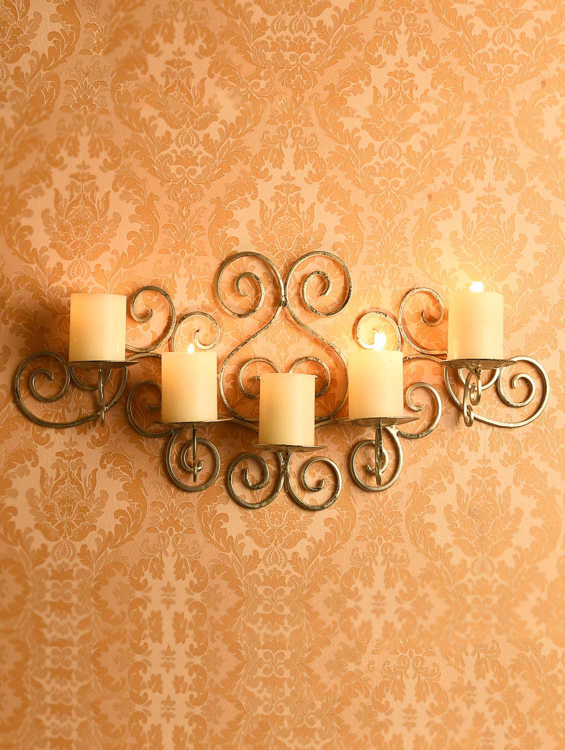 black decorative wall sconce with free candles