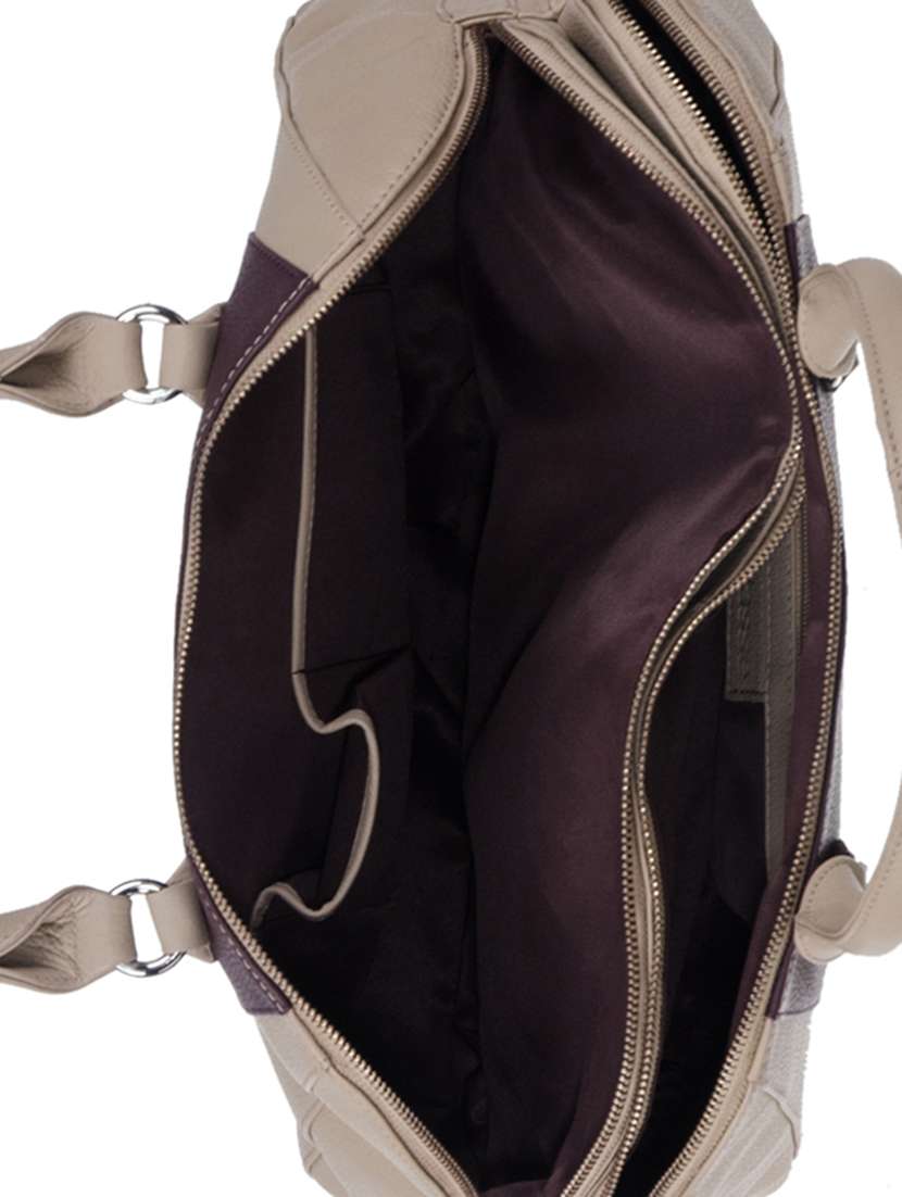 purple leather handbag - 15059339 -  Standard Image - 2