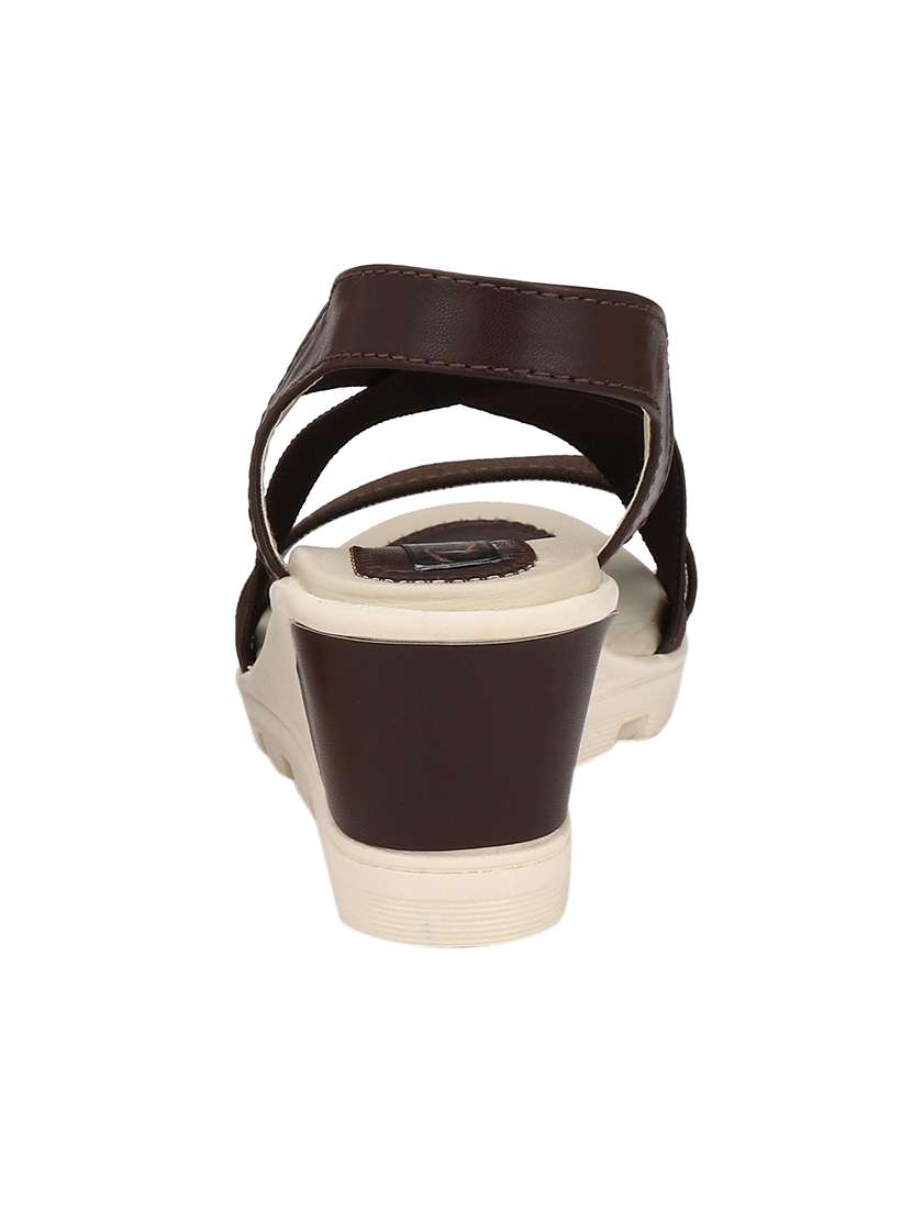 brown back strap wedges - 15431764 -  Standard Image - 2