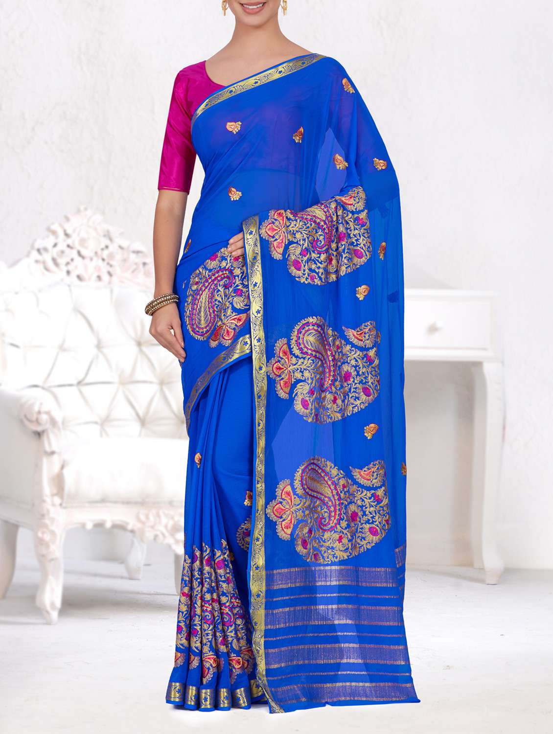 gold border paisley embroidered saree