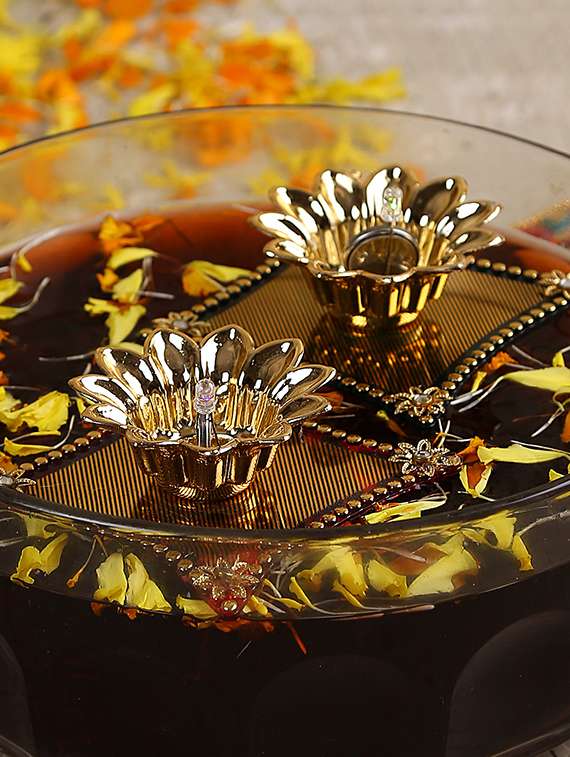 aapno rajasthan stunning gold green floating candle - 15649160 -  Standard Image - 2