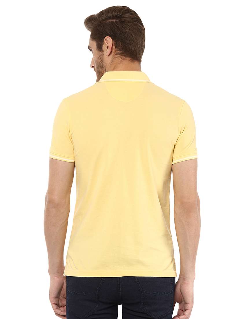 solid yellow polo t-shirt - 15772624 -  Standard Image - 2