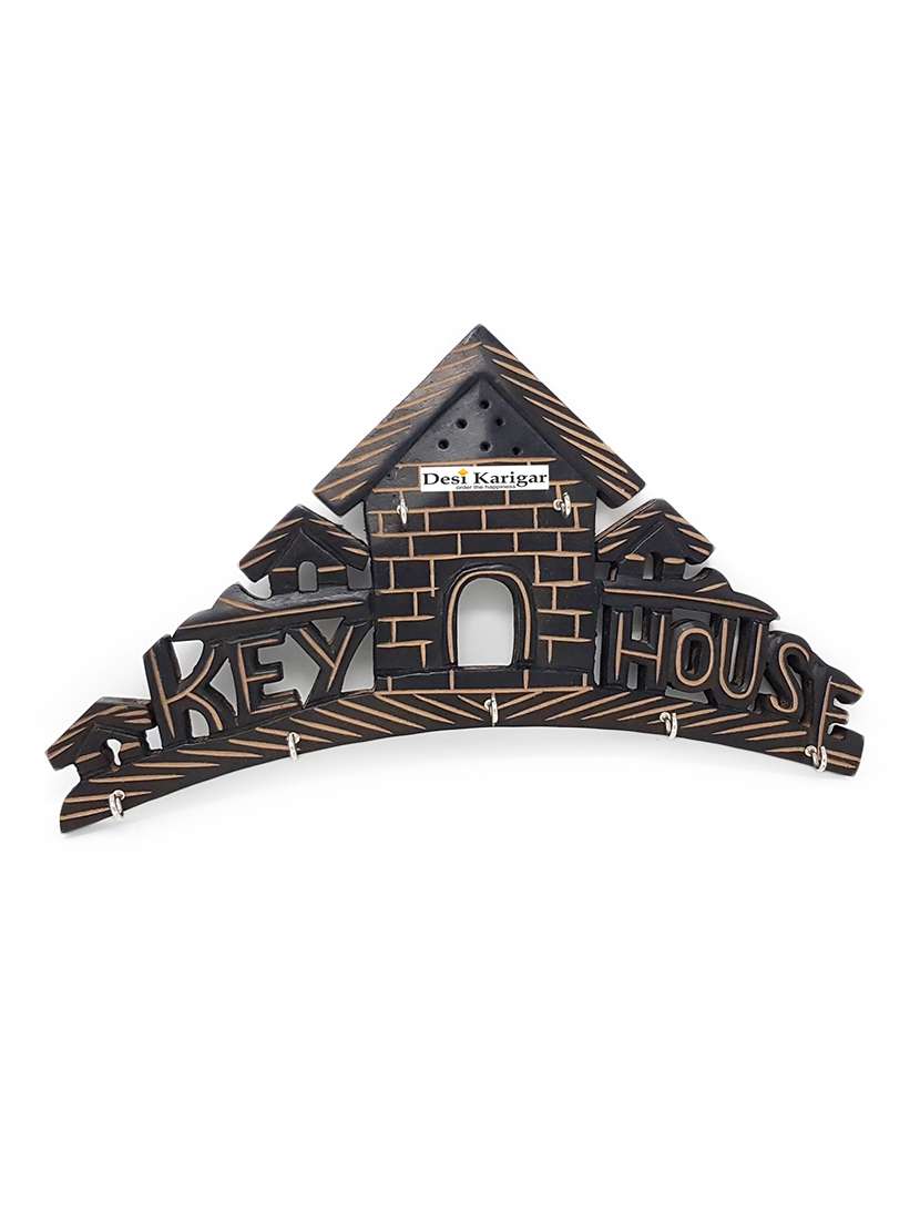 desi karigar wooden key holder in hut shape with handicraft design