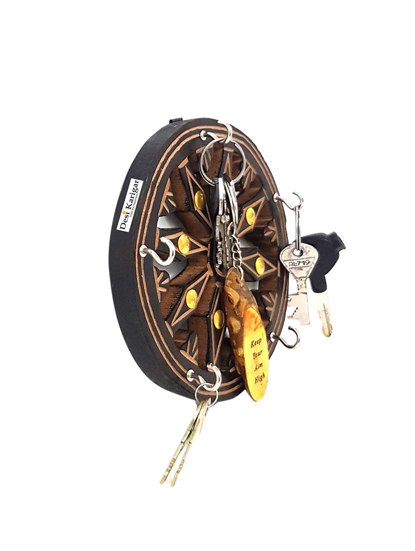 desi karigar wooden key holder in wheel shape with handicraft design and brass inlay - 15891015 - Standard Image - 2