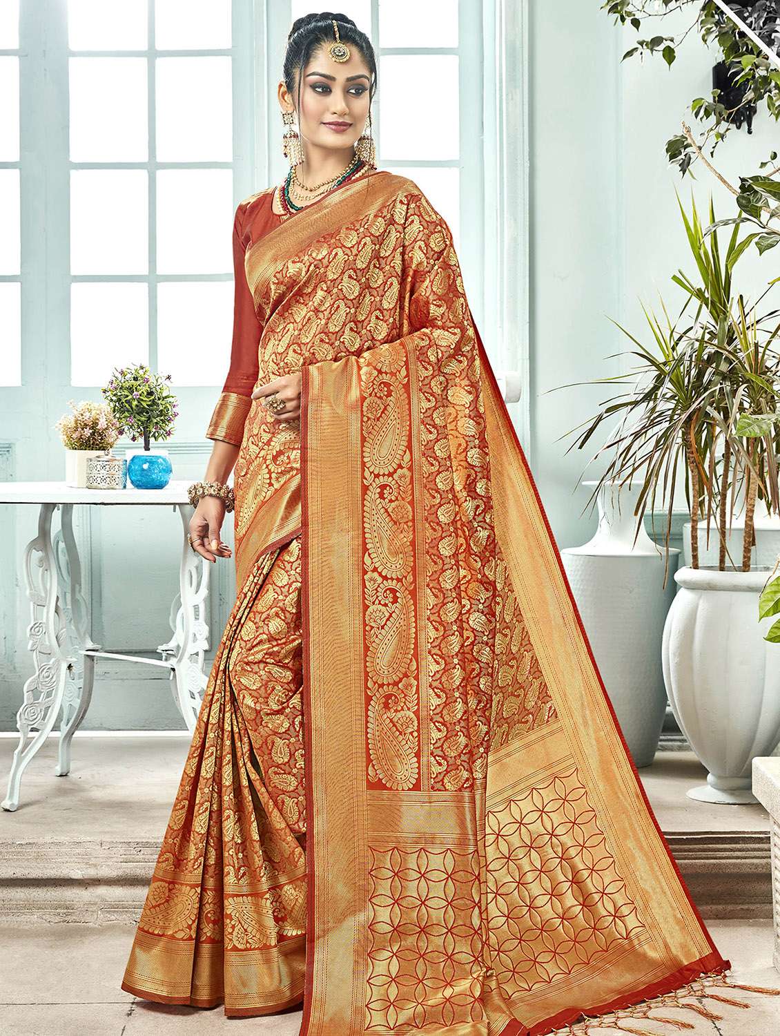 paisley zari motif orange kanjivaram saree with blouse