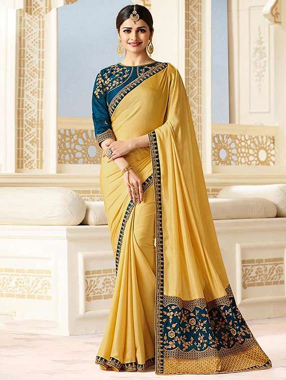 yellow embroidered border saree with blouse