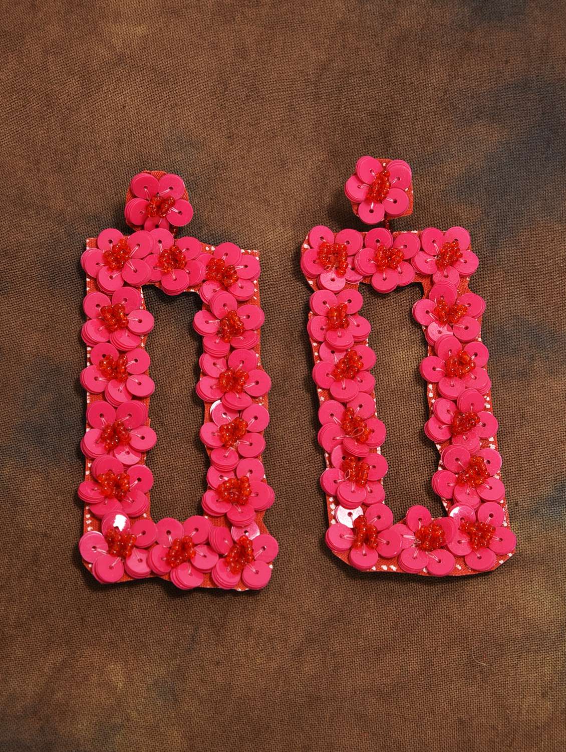 pink metal drop earring