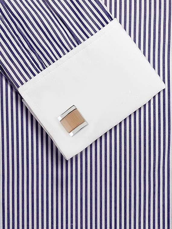 brown  metal cufflink - 16254776 -  Standard Image - 2