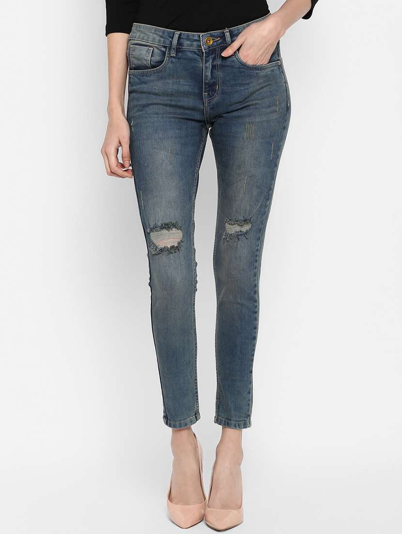 high rise distressed jean