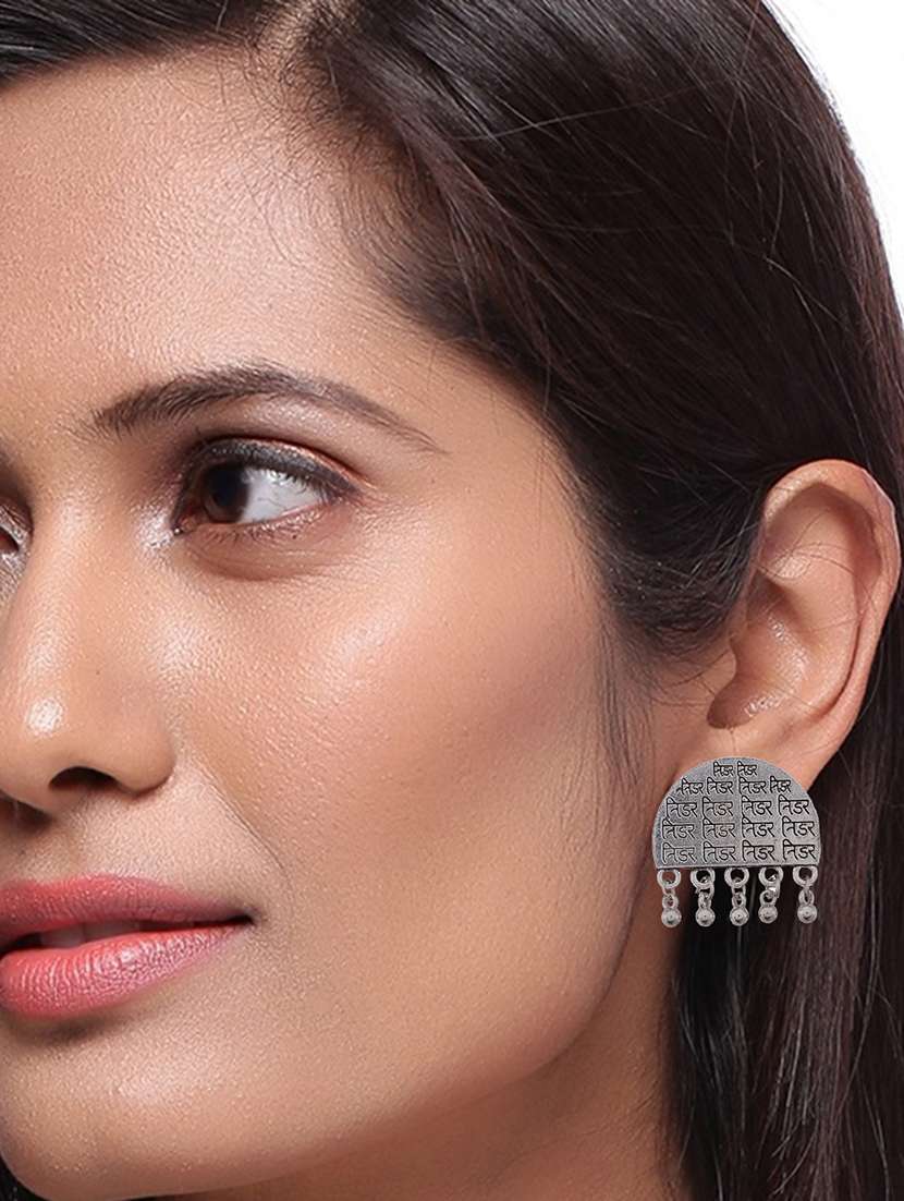 silver metal earring - 16641444 -  Standard Image - 2