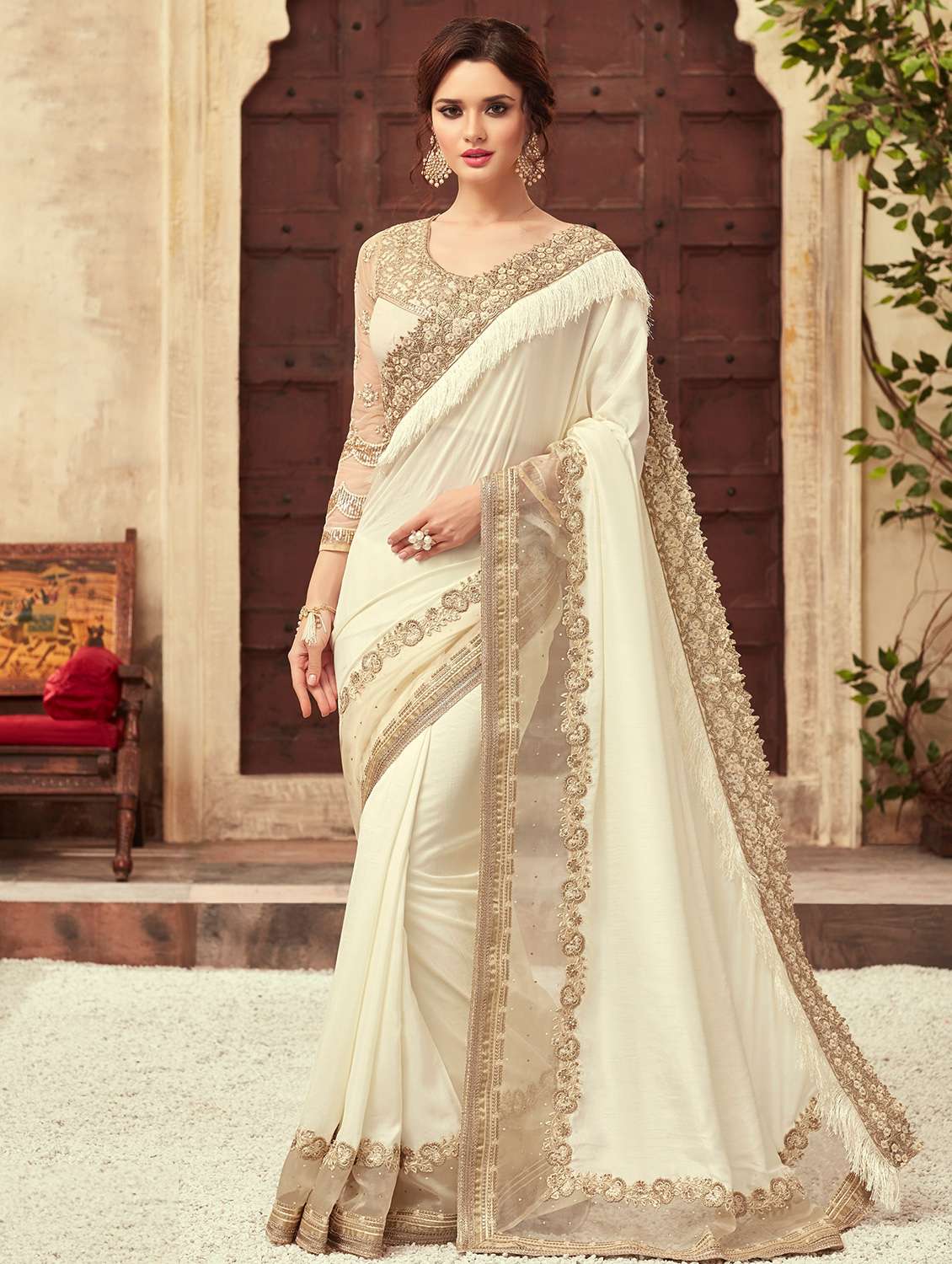 solid embroidered bordered saree with blouse
