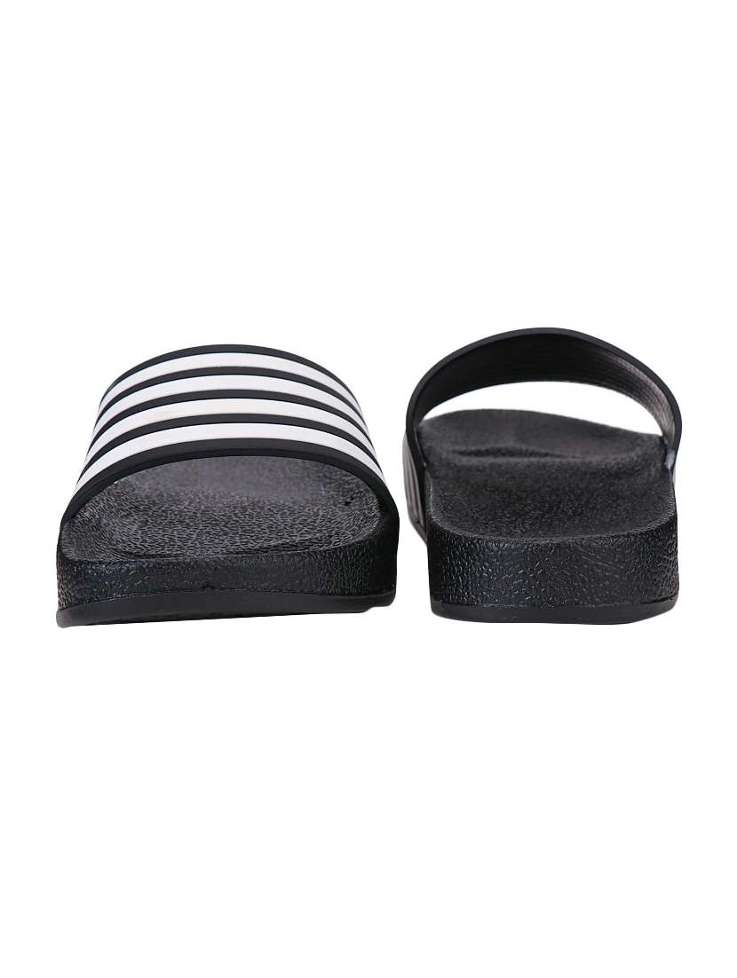 black rubber slip on flip flops - 16833985 -  Standard Image - 2