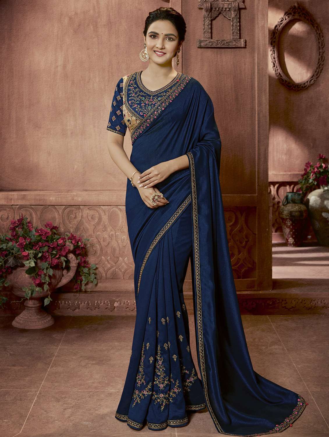 self design embroidered saree with blouse