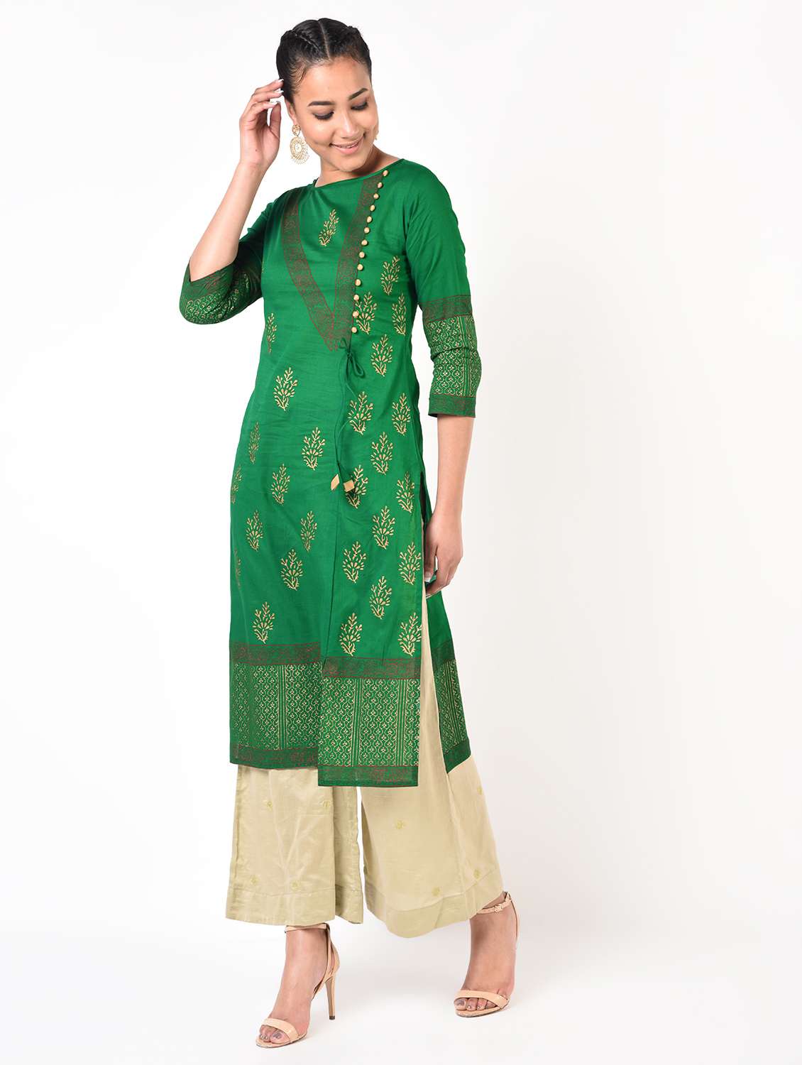women gold print straight kurta