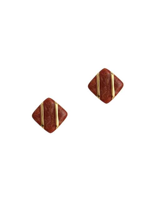 brown metal studs earring - 17041173 -  Standard Image - 0