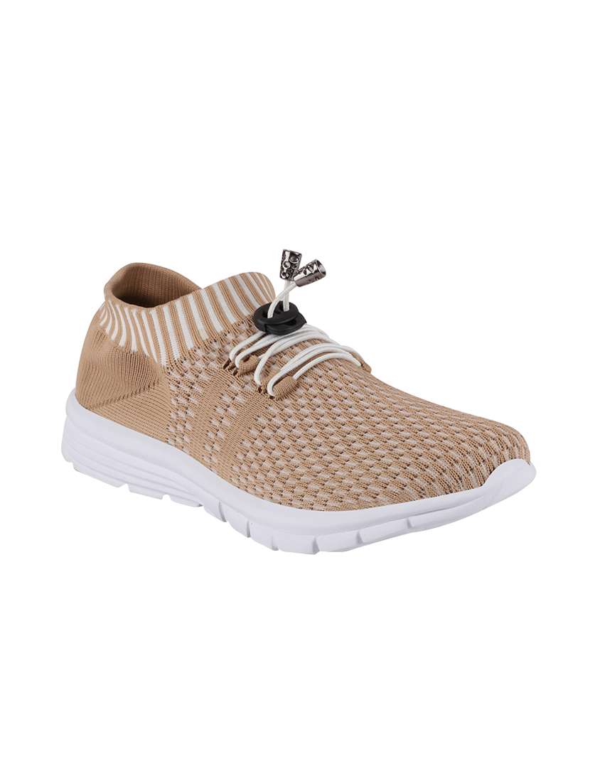 beige lace-up sports shoes