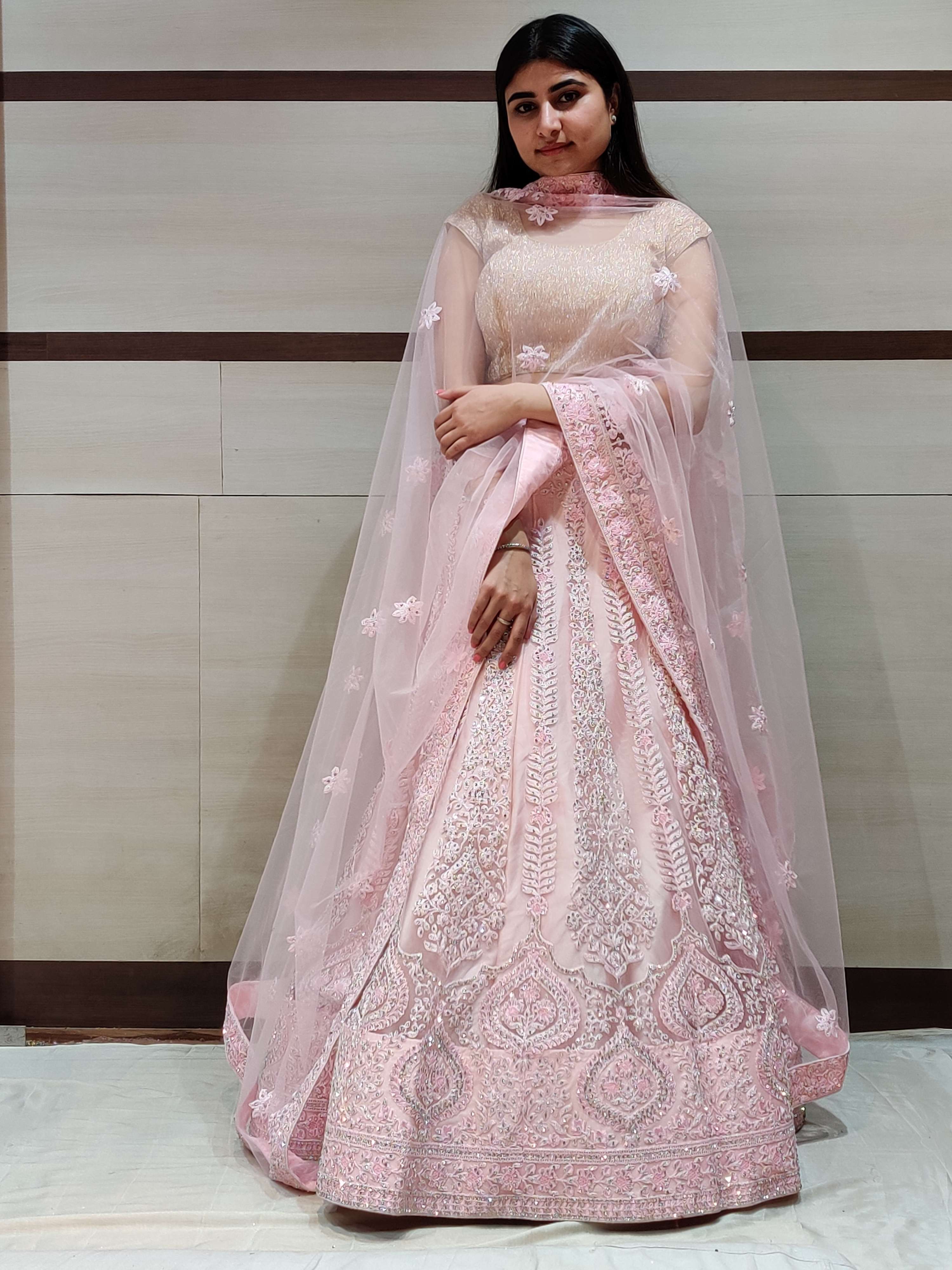 pink lehenga choli with dupatta. 