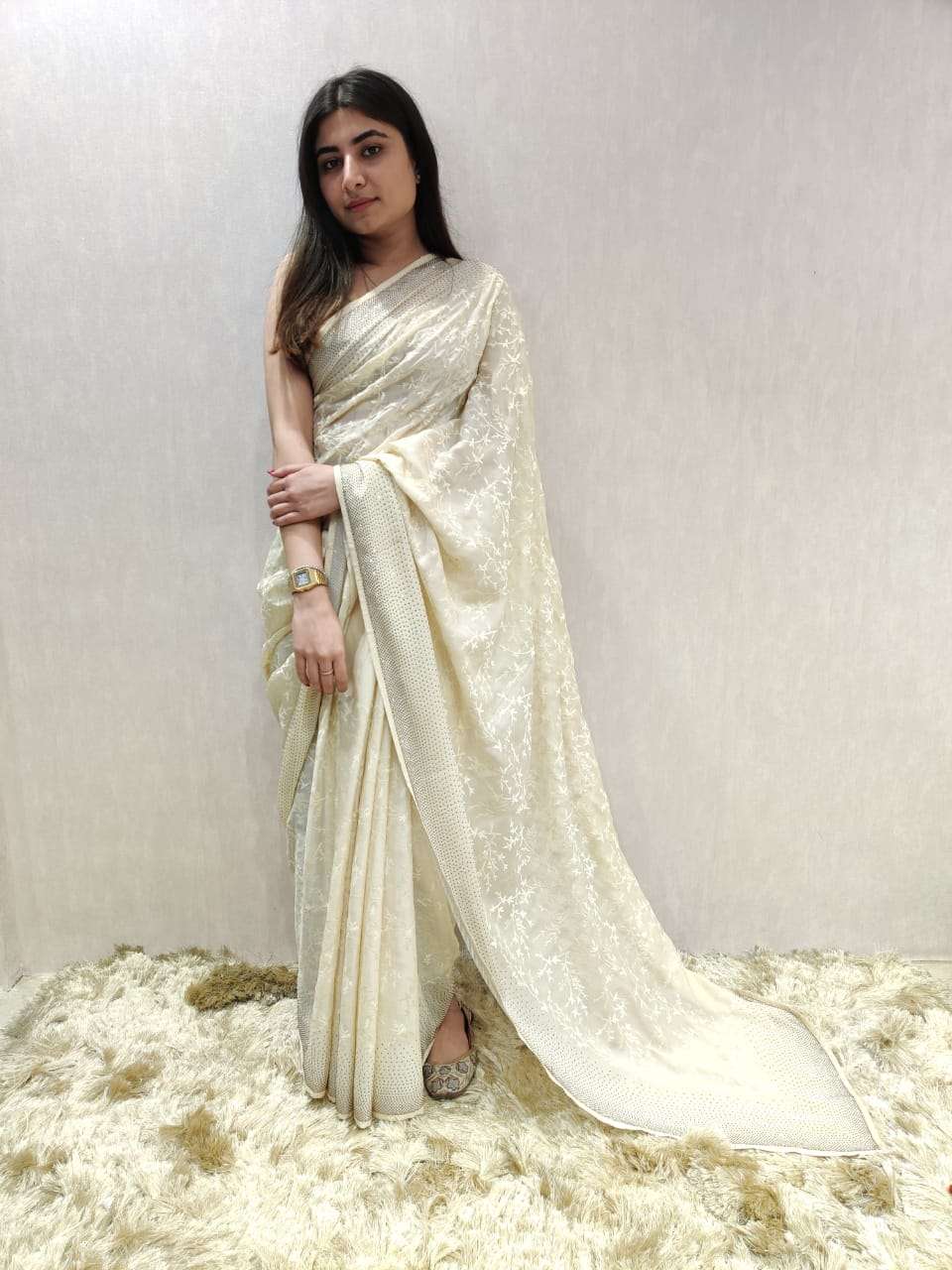 cream embroidered saree 