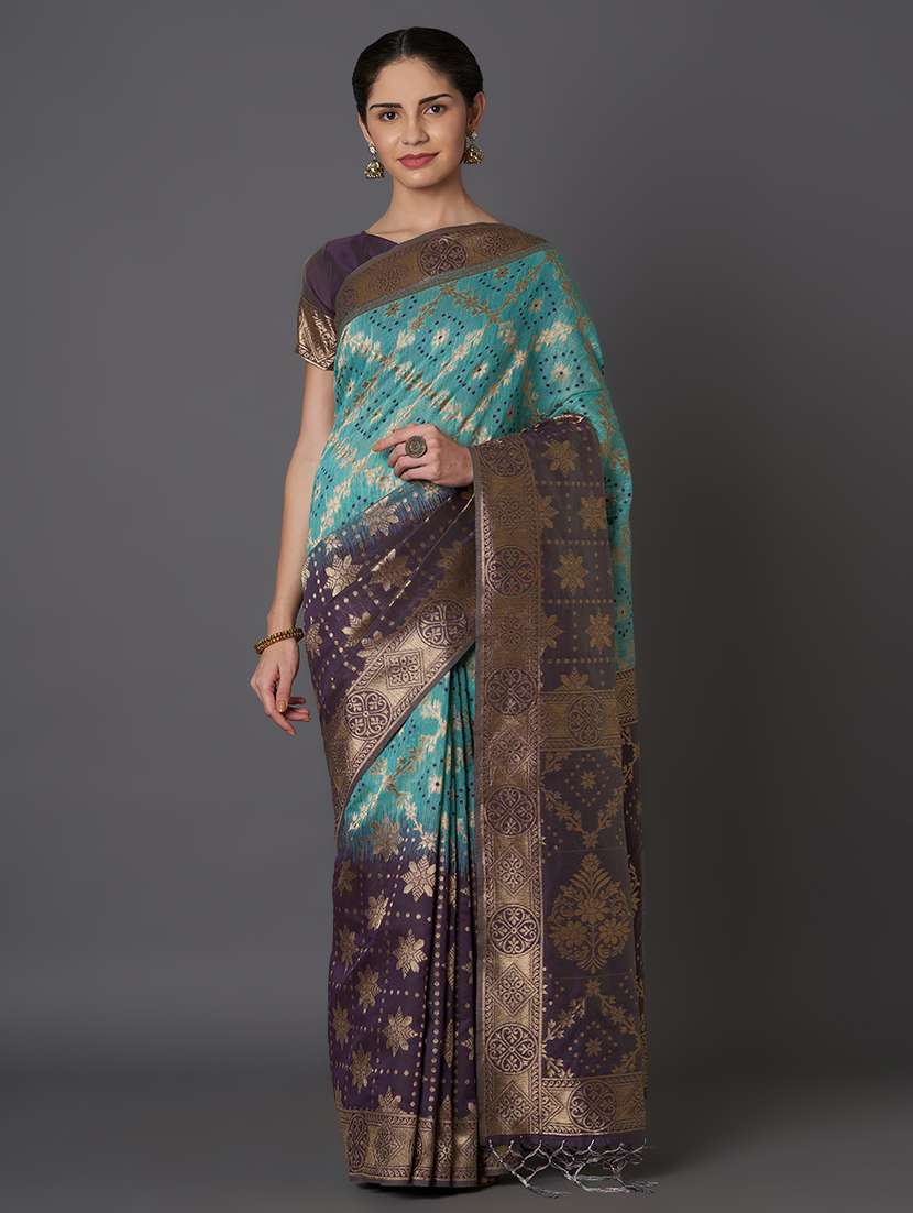 women's self design teal colored saree
