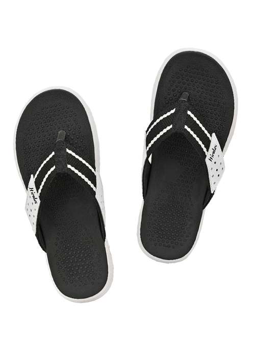 white fabric slip on slippers - 17599497 -  Standard Image - 0