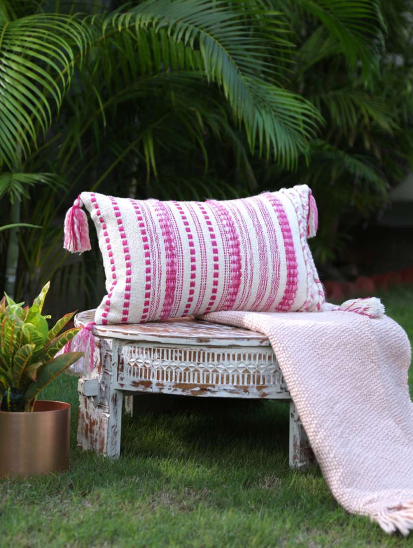 ivory and fuschia pillow style cushion cover with tassels