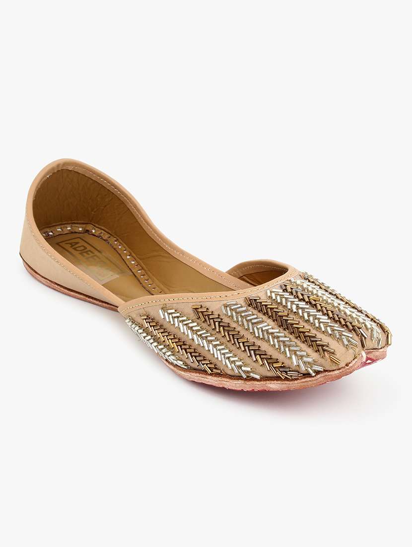 gold slip on jutis 