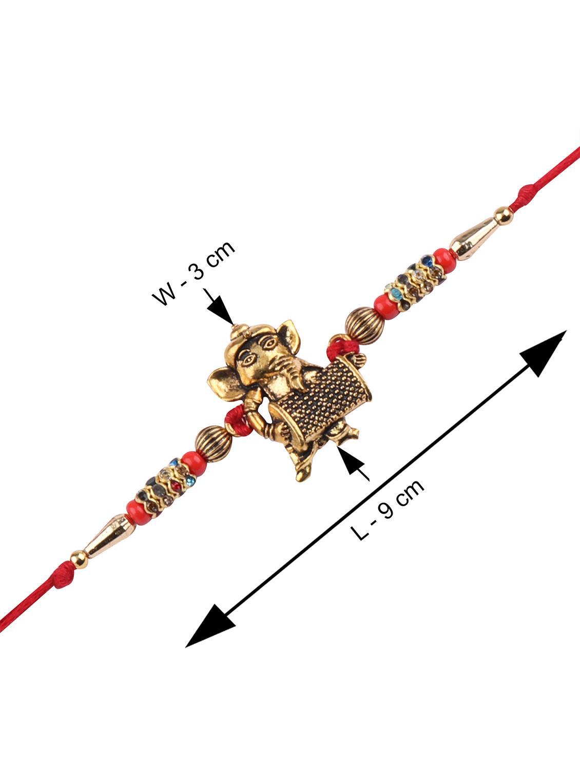 red gold plated thread rakhi with roli chawal and greeting card - 17900794 - Standard Image - 2