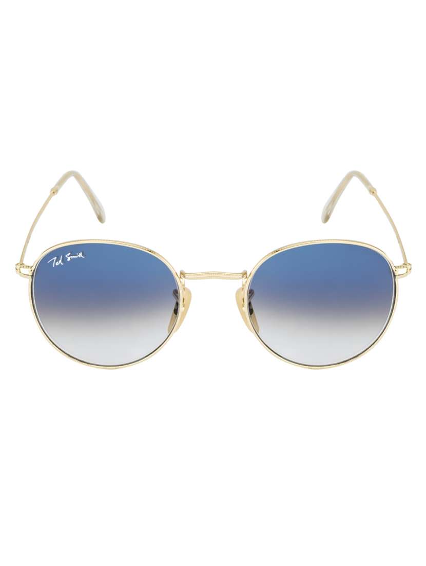 moon-x by ted smith in black frame with round blue graded lens sunglass