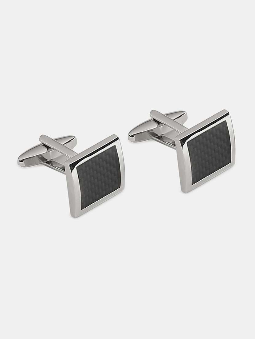 silver and black metal cufflink