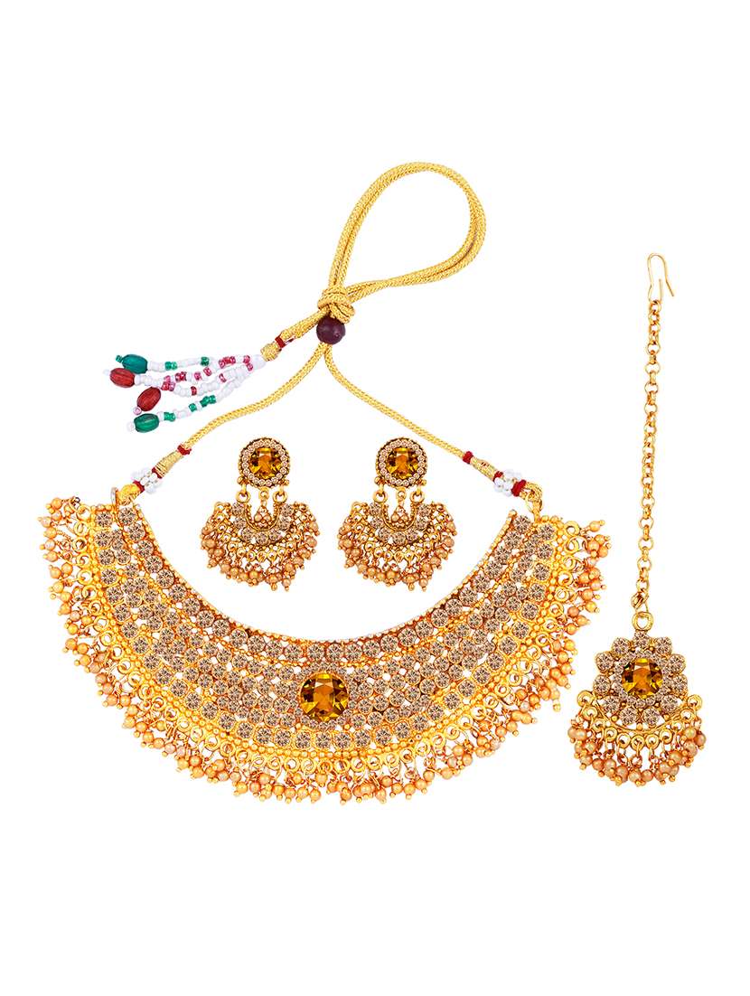 gold metal choker necklace with earring and maangtikka