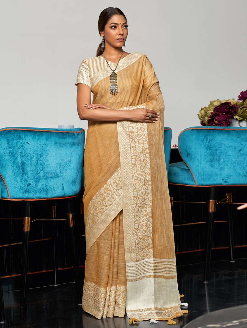 women's self design beige colored saree with blouse