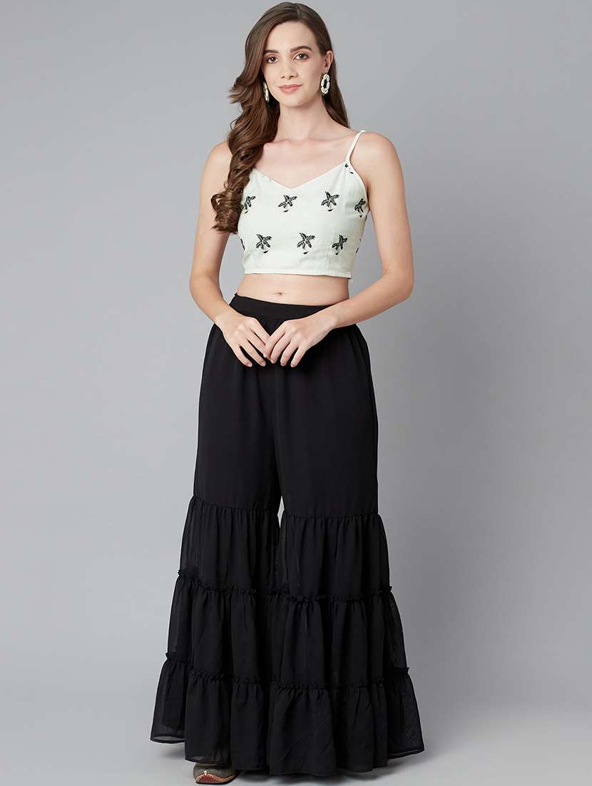 white embroidered top and sharara set 