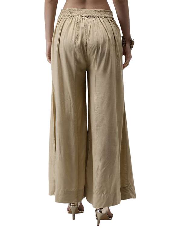 beige solid flared palazzo - 18178655 -  Standard Image - 2