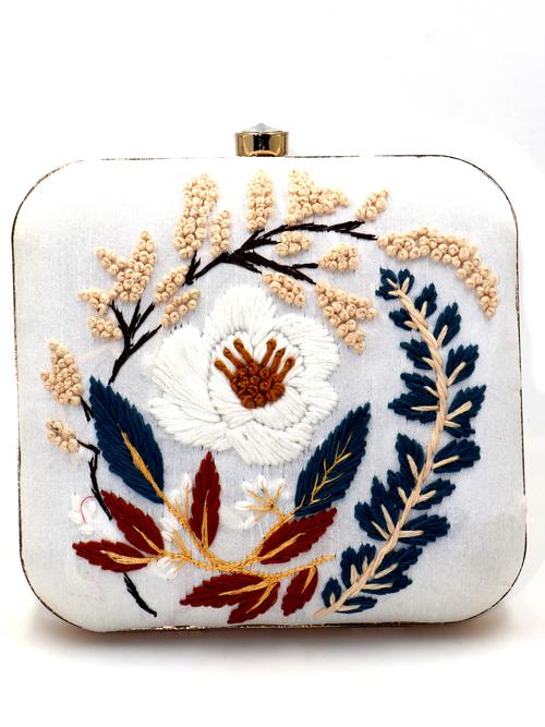 designer hand embroidery on white silk  - 18187108 -  Standard Image - 0