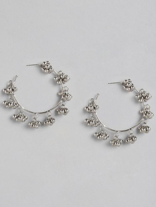 silver metal hoop earring - 18299793 -  Standard Image - 0