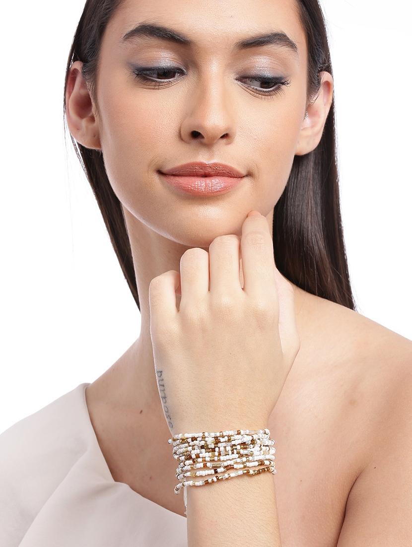 beige metal bangle bracelet - 18300632 - Standard Image - 2