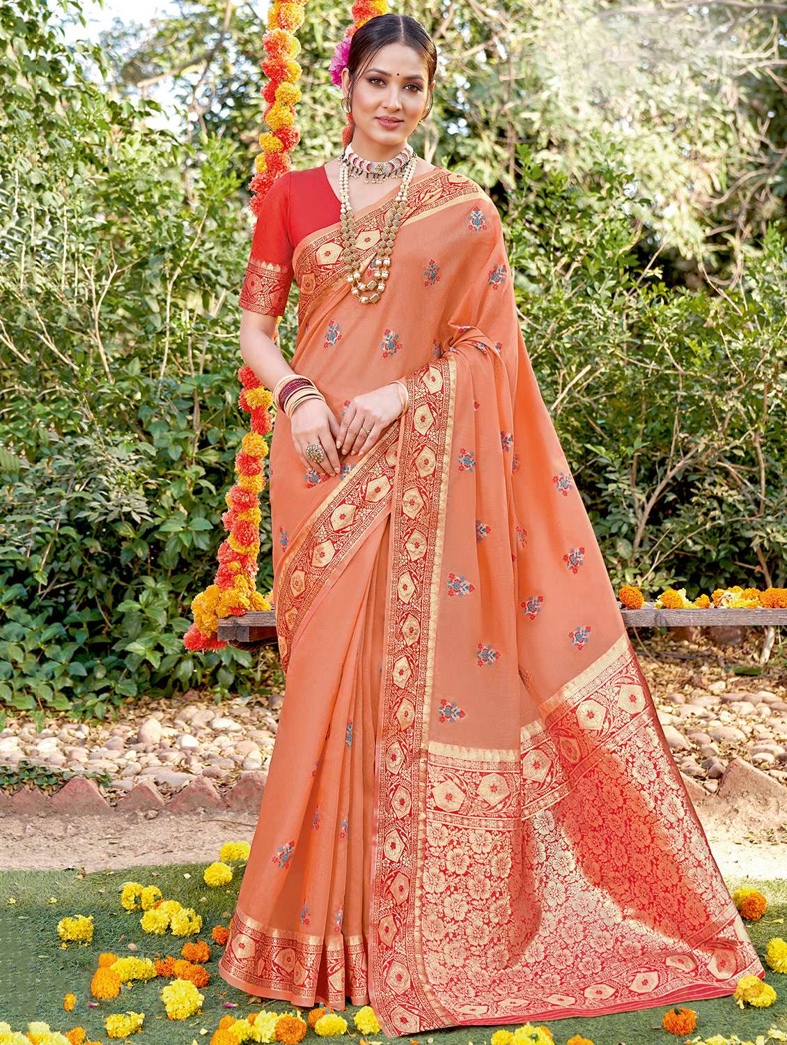 women's floral peach colored saree with blouse