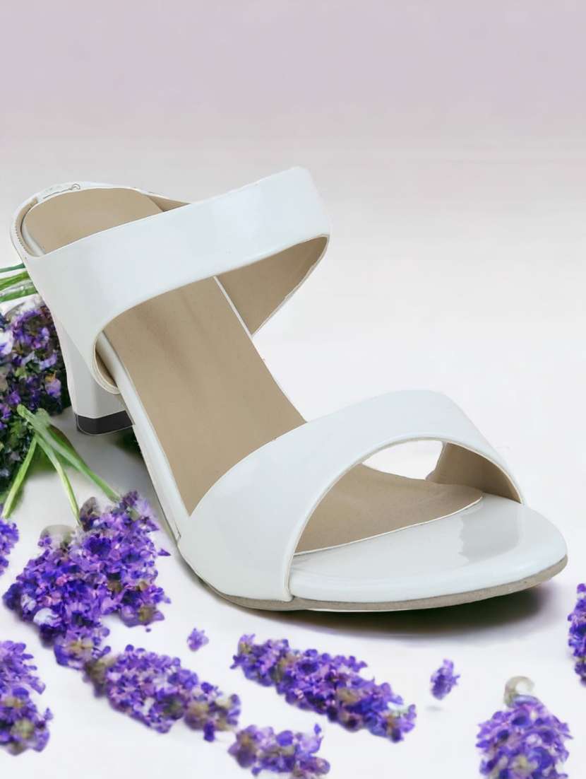 white synthetic slip on sandals