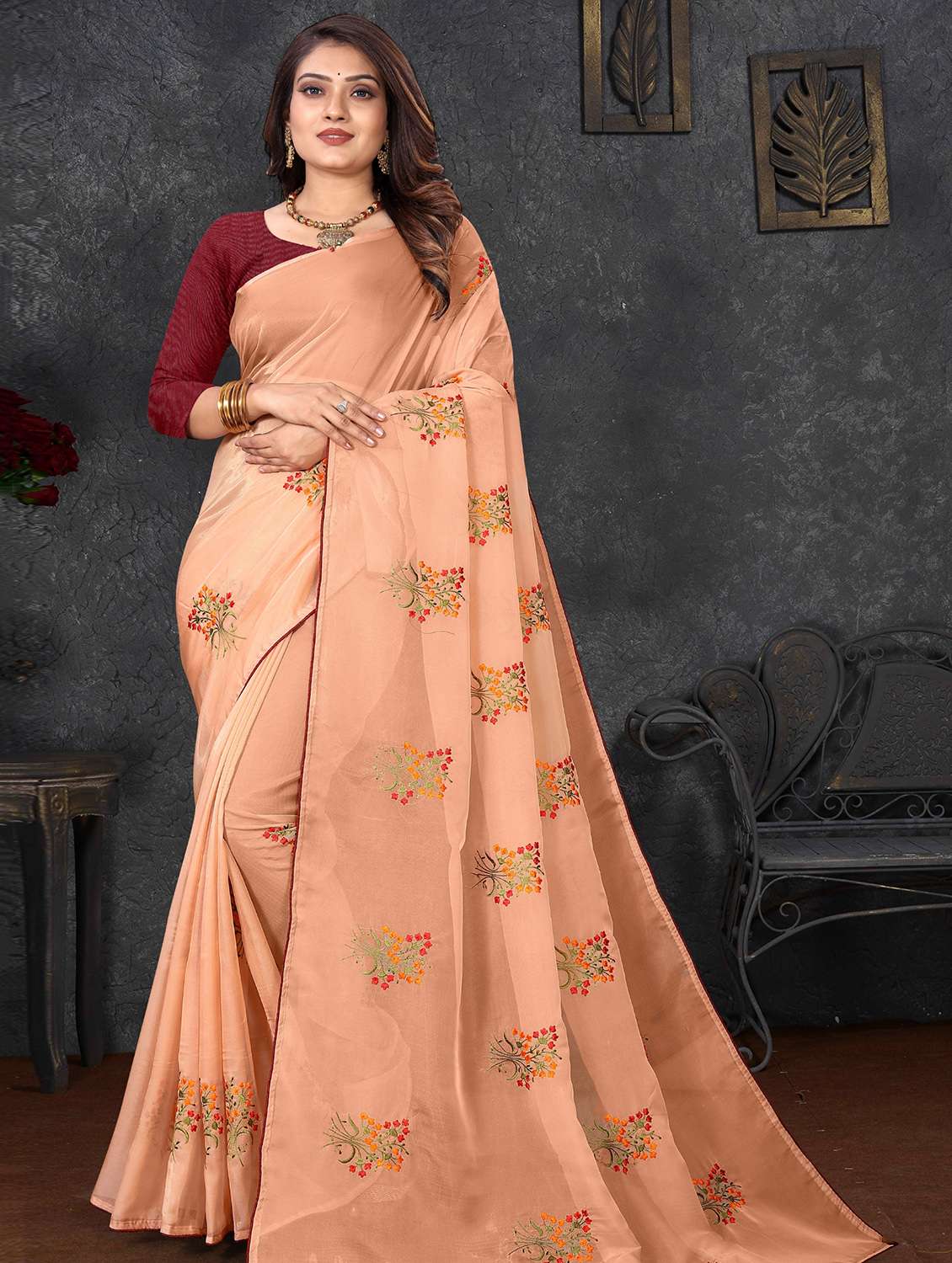 self design peach embroidered saree  with blouse