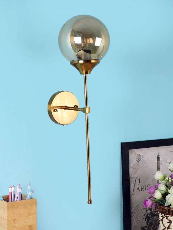 glaring gold iron wall lights