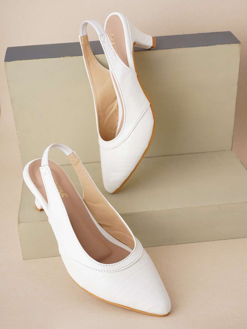 white solid pumps