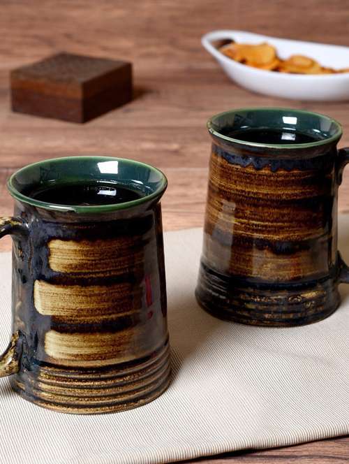brown ceramic mug