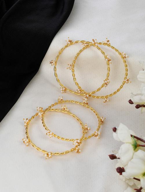 set of 4 gold plated pearl twisted bangles - 18380622 -  Standard Image - 0